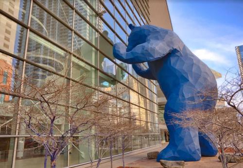 a large blue bear statue in front of a building at Cozy upper unit great for family visiting Zoo medica campus and downtown in Denver