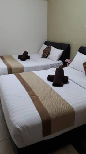 Postel nebo postele na pokoji v ubytování Camlodge budget hotel