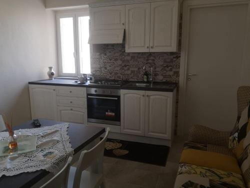 Kuchyň nebo kuchyňský kout v ubytování maison giovanna