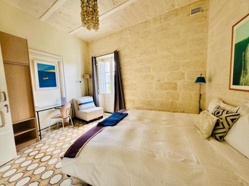 Postel nebo postele na pokoji v ubytování Nelli's B&B
