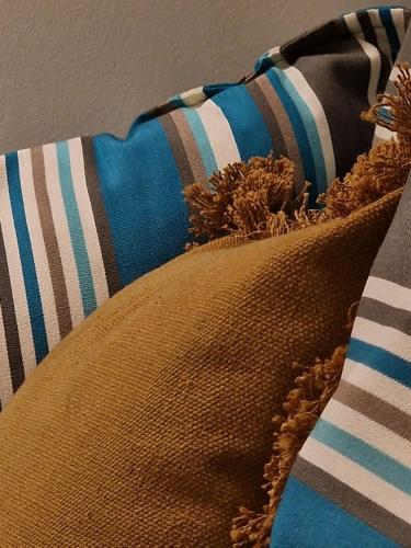 a close up of a pillow with a pillowablish at Apartment C-MM09 in Bussi sul Tirino