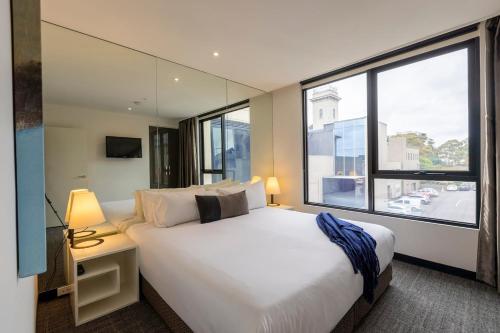 Postel nebo postele na pokoji v ubytování Corporate Living Accommodation Hawthorn