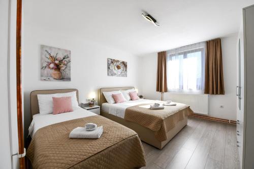 Posteľ alebo postele v izbe v ubytovaní Apartment Mlađen