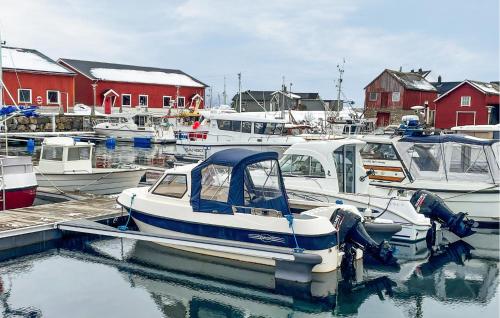 a group of boats are docked in a marina at Lovely Apartment In Myklebost With Wifi in Myklebost