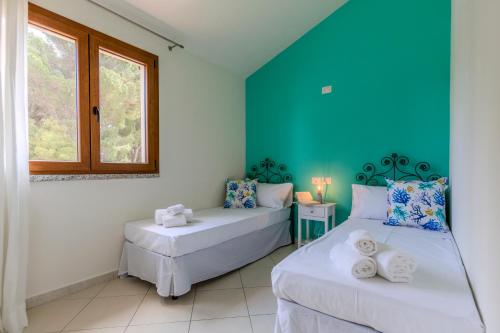 Ένα ή περισσότερα κρεβάτια σε δωμάτιο στο Casa Pintada, 400m to beach