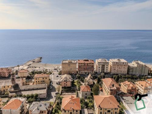 an aerial view of a town next to the ocean at HOTIDAY Room Collection - Varazze in Varazze