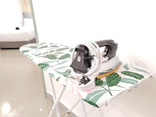 a chair with a camera on top of it at Amazing Petaling Jaya Corner Landed Home Paradigm Mall, 5 Bedroom for up to 18Pax, LDP, Kelana Jaya, Paradigm Mall in Petaling Jaya