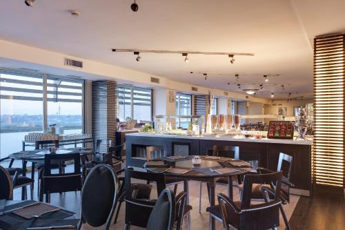 オクシデンタル アラン パークにあるレストランまたは飲食店