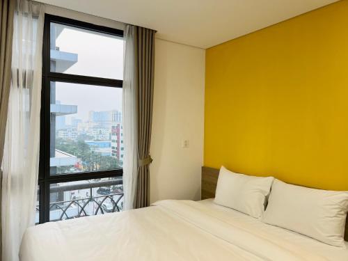 Katil atau katil-katil dalam bilik di 22Land Legend Hotel & Residence