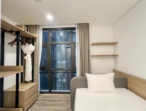 Katil atau katil-katil dalam bilik di 22Land Legend Hotel & Residence