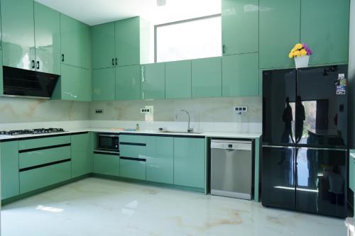 Una cocina o zona de cocina en KiwiOz Villa