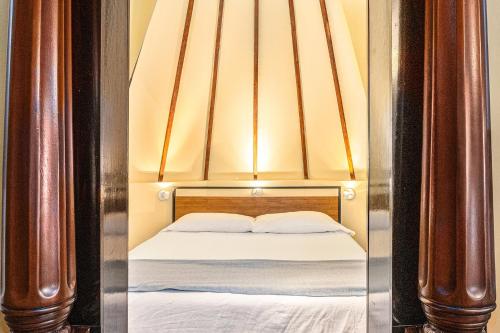 Ένα ή περισσότερα κρεβάτια σε δωμάτιο στο Hassinger Daniels Guest House