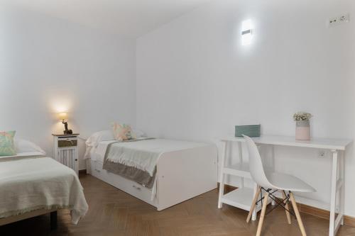 Postel nebo postele na pokoji v ubytování Casa Palacios Conil de la Frontera