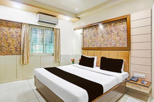 Katil atau katil-katil dalam bilik di Super Hotel O Kesarganj Formerly Suman Palace