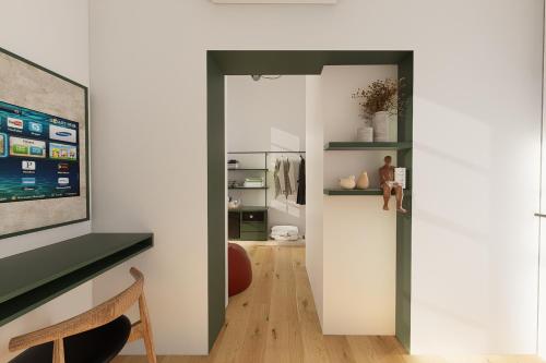 a room with white walls and a hallway with shelves at Kentrikon 1924 Boutique Hotel, Paphos Old Town in Paphos City
