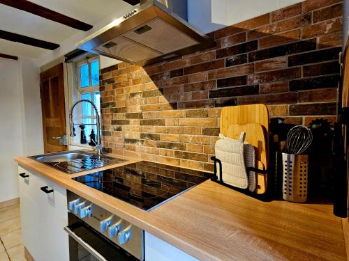 Kuchyň nebo kuchyňský kout v ubytování Ferienhaus Lasterbühl