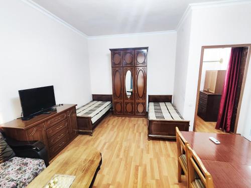 Katil atau katil-katil dalam bilik di Erebuni Family Apartments