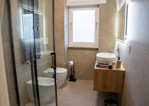 Koupelna v ubytování immerso nel verde a due passi dal centro