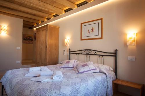 Letto o letti in una camera di Scorci Di Mare