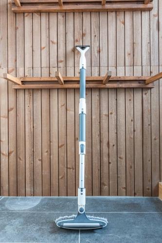 a sword is sitting in front of a wooden fence at L&R RUSUTSU - Vacation STAY 05019v in Kimobetsu