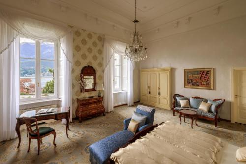 a living room with a couch and a table at Grand Hotel Villa Serbelloni - A Legendary Hotel in Bellagio