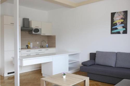 Una cocina o zona de cocina en Apartmenthotel Karawankenblick