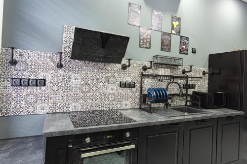 Una cocina o zona de cocina en Residence IRON CUBE