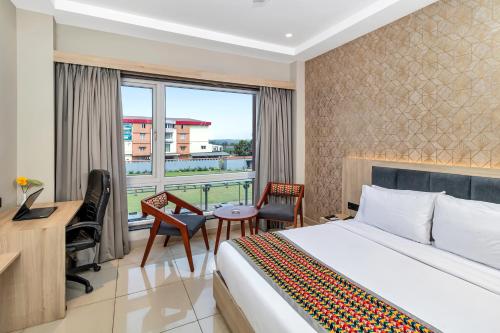 Postel nebo postele na pokoji v ubytování The Citi Residenci Hotel, Banskopa