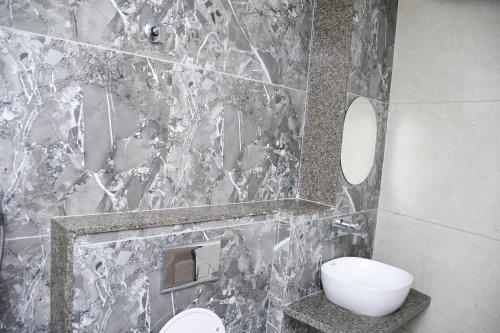 Koupelna v ubytování Hotel Morvi Nandan