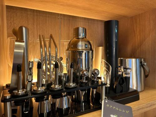 a counter with a coffee maker on a shelf at L&R RUSUTSU - Vacation STAY 05027v in Kimobetsu
