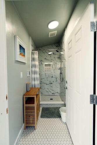 a bathroom with a shower and a toilet at Cozy Glamping Pod for a Nature Escape in Monticello, Utah in Monticello