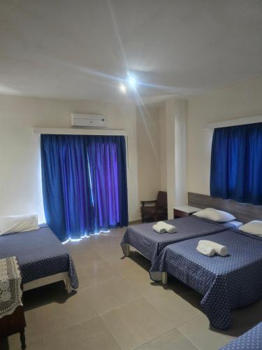Ένα ή περισσότερα κρεβάτια σε δωμάτιο στο Eleni Apartments 