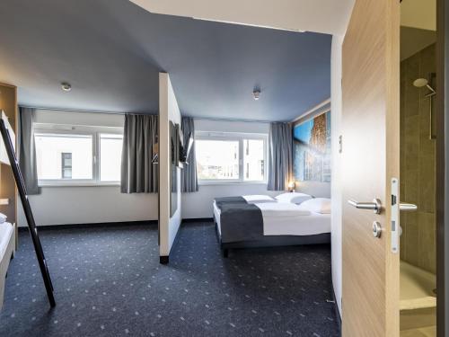 Postel nebo postele na pokoji v ubytování B&B Hotel Schweinfurt-City