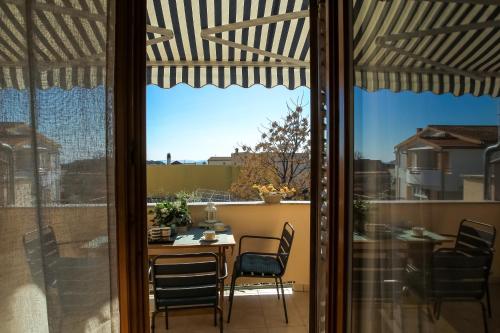 Cozy Retreat with Parking, Balconies & Garden Fireplace