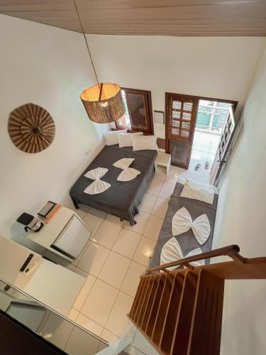 an overhead view of a bedroom and a living room at Pousada Brasil Caribe in Morro de São Paulo