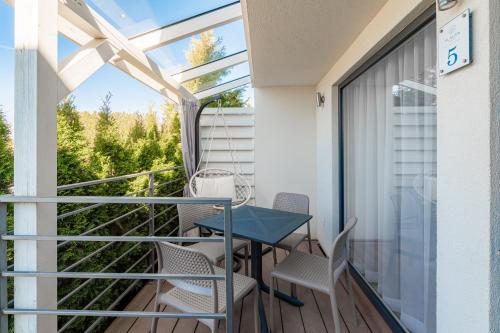 シャノジェンティにあるFLAUTA Całoroczne domki z prywatną balią, sauną i jacuzziのギャラリーの写真