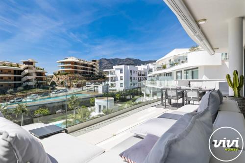 an apartment balcony with a view of the city at ViVi Homes - Casa Española in Fuengirola
