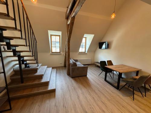 TV a/nebo společenská místnost v ubytování Pinnerbergstube Ferienwohnung Cochem Mosel