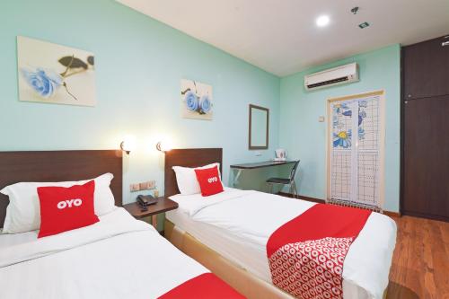 Postel nebo postele na pokoji v ubytování Dancenter 88 Hotel