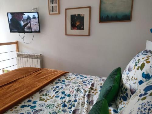 Postel nebo postele na pokoji v ubytování La Suite 27 bis