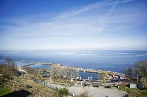a view of a body of water with boats in it at Ferienwohnung mit traumhaftem Meerblick - Haus am Meer FeWo 11 in Lohme