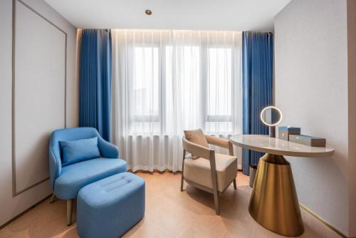 Mido Hotel - Nanning Anji Wanda Plaza Branchにあるシーティングエリア