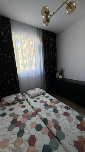 Postel nebo postele na pokoji v ubytování Apartament Dębowe Wzgórze II