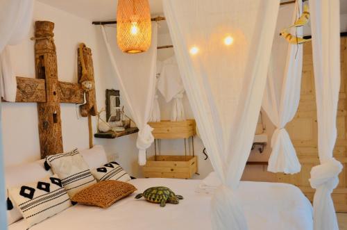 Ένα ή περισσότερα κρεβάτια σε δωμάτιο στο Tides Signature Koh Chang boutique resort