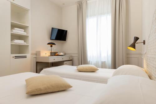Cama o camas de una habitación en Albergo Chiusarelli