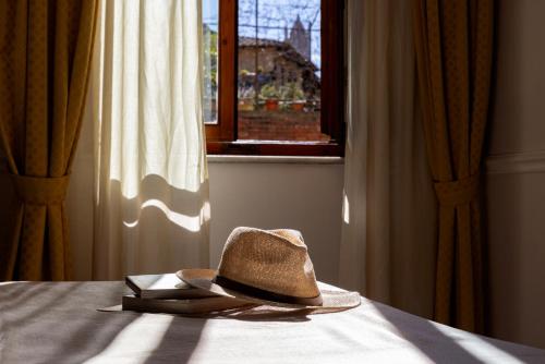 Cama o camas de una habitación en Albergo Chiusarelli