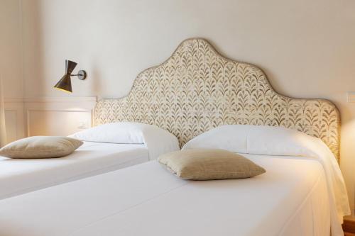 Cama o camas de una habitación en Albergo Chiusarelli