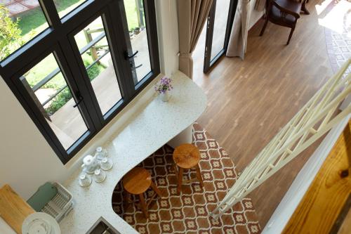 Гостиная зона в Gỗ Bungalow & Homestay