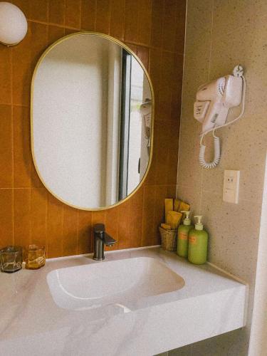 Ванная комната в Gỗ Bungalow & Homestay