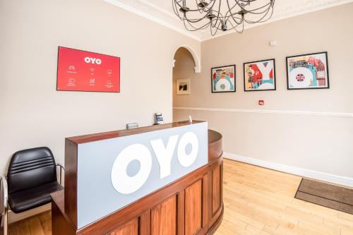 a large tv in a room with a chair at Dancenter Bristol near Clifton Down Station in Bristol